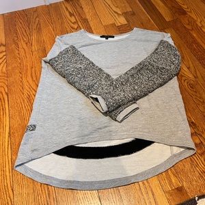 Generation Love gray sweatshirt with metallic tweed sleeves.  Hi-lo waist